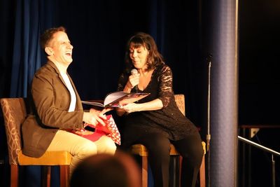 During Christine Pedi's show, she gifted Seth the book A Is For Audra. Here she is re Photo