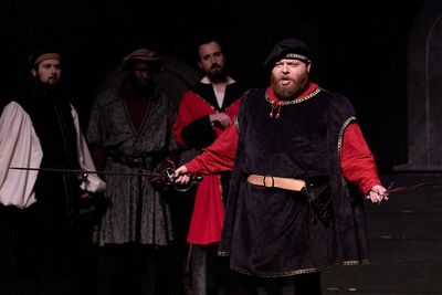 Tybalt (William Green) expressing his hatred for the Montagues.  Photo