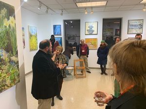 John Lant giving a tour of the Park Theatre and art gallery, which is showing the art Photo
