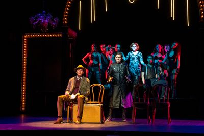 Andy Tighe (seated), Eddie Maldonado (center), Jillian Louis (rear) and cast Photo