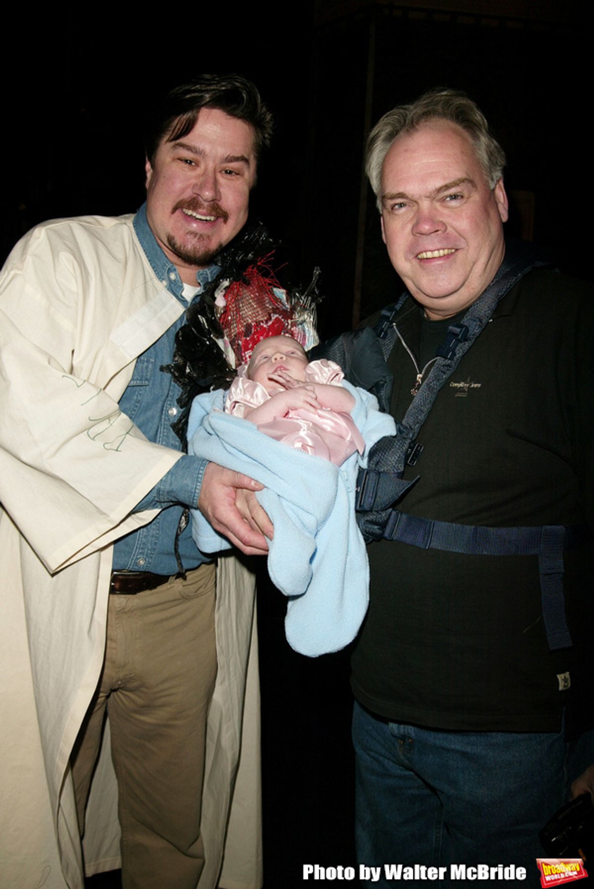 Merwin Foard ( Gypsy winner La Cage Aux Folles ) 
with cast member Michael Mulheren with his newborn daughter Attending the Opening Night Gypsy Robe Ceremony for LA CAGE aux FOLLES at the Marquis Theatre in New York City.
December 9, 2004 at 