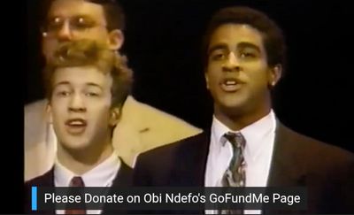 Back in his a cappella days... Obi Ndefo singing with the Baker''s Dozen on the Arsen Photo