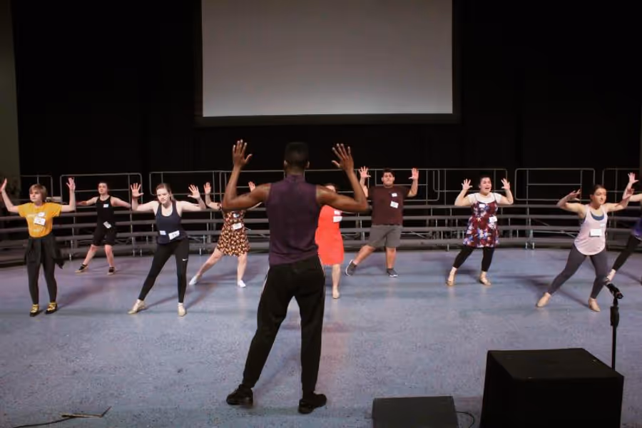 Behind the Curtain: Meet Director/Choreographer Devon Sinclair Image