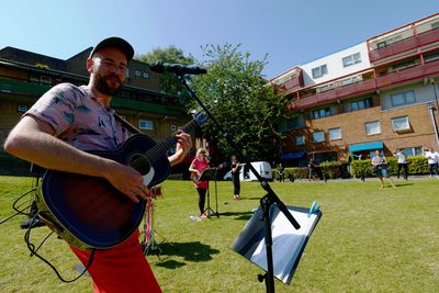 Musician Jeremy Bradfield in a pop up performance for Byker estate residents as part  Photo