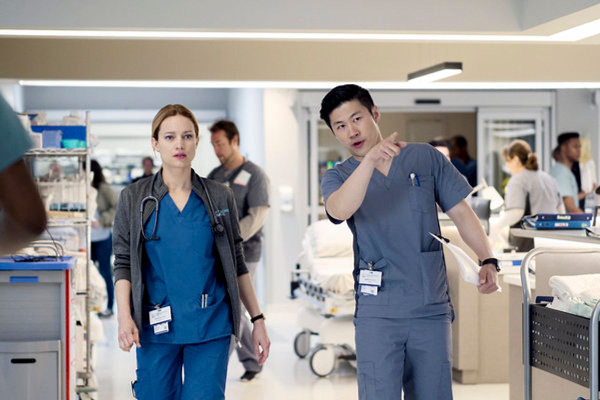 Laurence Leboeuf as Dr. Magalie Leblanc, Kenny Wong asArnold De Luca (Photo by: Yan Turcotte/Sphere Media/CTV/NBC) at See Hamza Haq, Ayisha Issa, and Laurence Leboeuf in TRANSPLANT on NBC