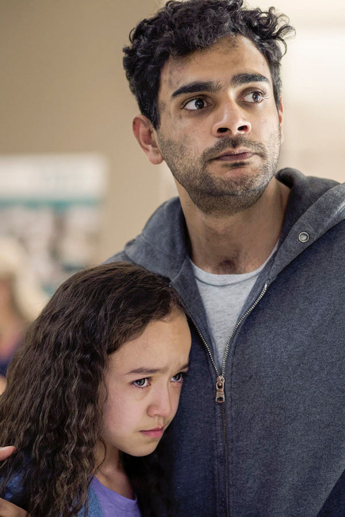 Hamza Haq as Dr. Bashir 'Bash' Hamed, Sirena Gulamgaus as Amira Hamed (Photo by: Yan Turcotte/Sphere Media/CTV/NBC) at 