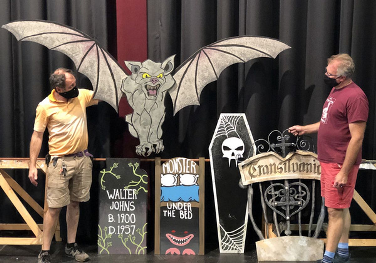 SUNY Cortland Technical Director Simone Scalici and Scenic Designer Scott Holdredge display gravestones, gates and other set pieces. at Cortland Rep Presents GHOSTS IN THE PARK