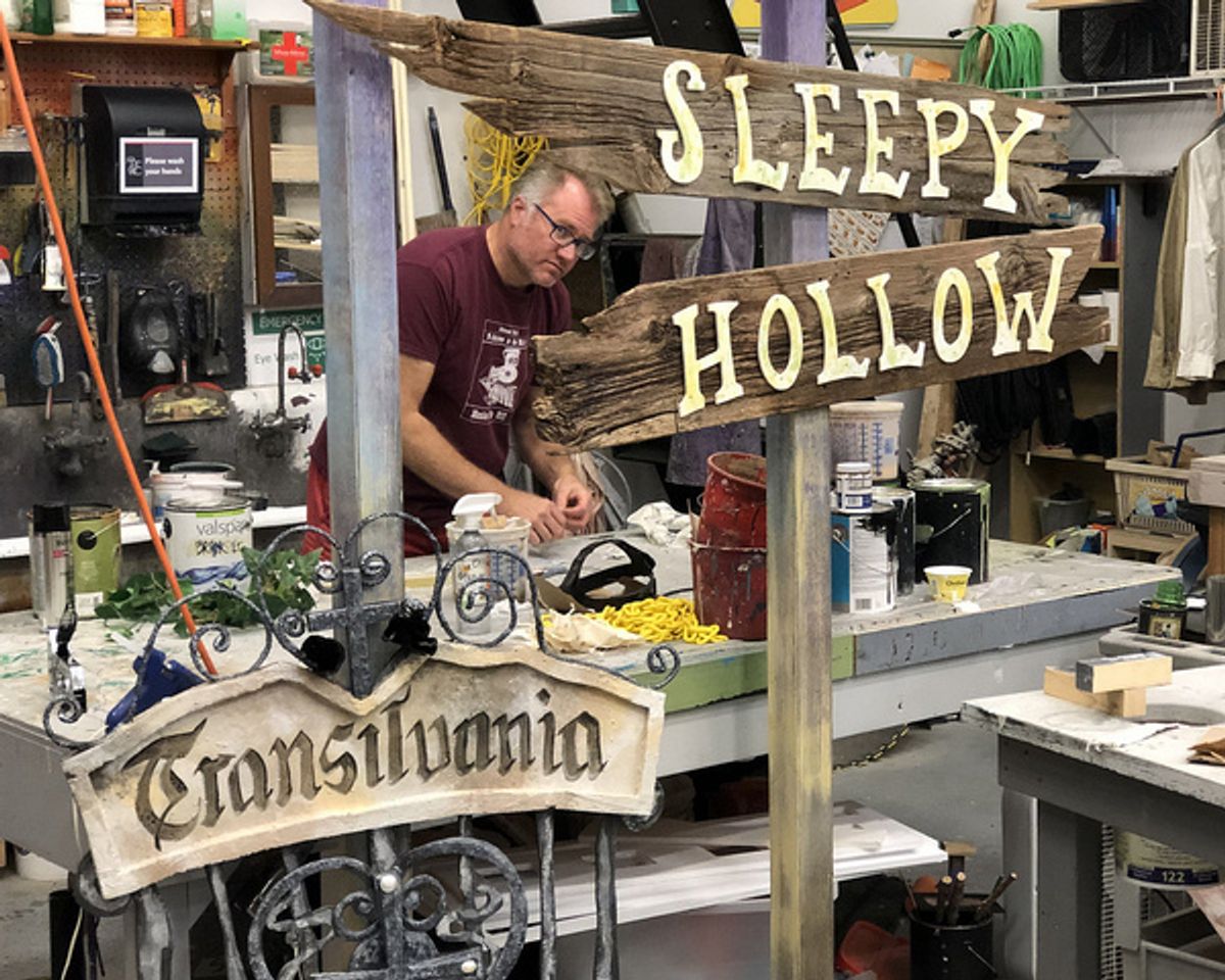 SUNY Cortland Scenic Designer Scott Holdredge works on final touches. at Cortland Rep Presents GHOSTS IN THE PARK
