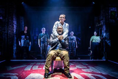 Dom Hartley Harris (Collins), Alex Thomas-Smith (Angel) and the Featured Ensemble in  Photo