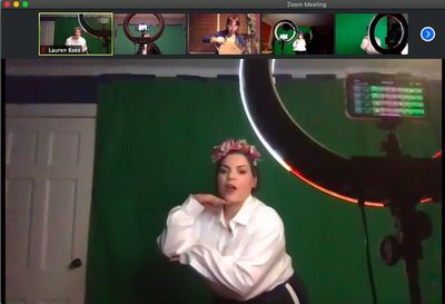 Lauren Baez rehearses her choreography just before doing another take Photo