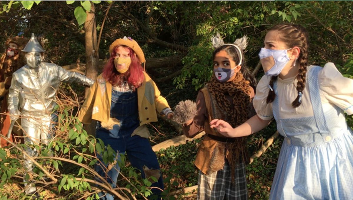Members of the combined Ensemble perform The Wizard of Oz in BTC?s backyard. at 