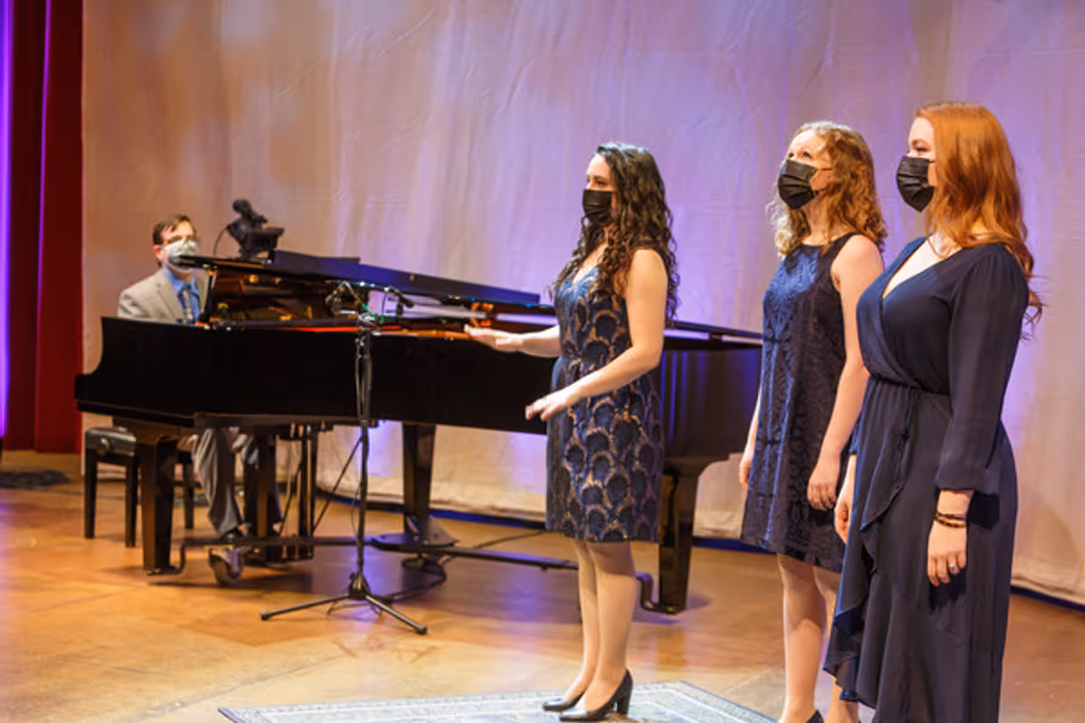 James Lesniak on piano; Véronique Filloux, Madeline Ehlinger,  Maire Therese Carmack at 
