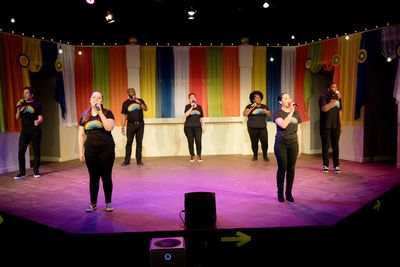 The cast of SONGS FOR A NEW DAY at Little Theatre of Virginia Beach sings We Are the  Photo