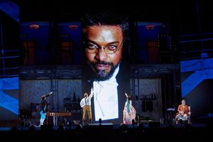 Kenneth Kellogg as Don Basilio, projected above Alek Shrader, Lucas Meachem, Daniela  Photo