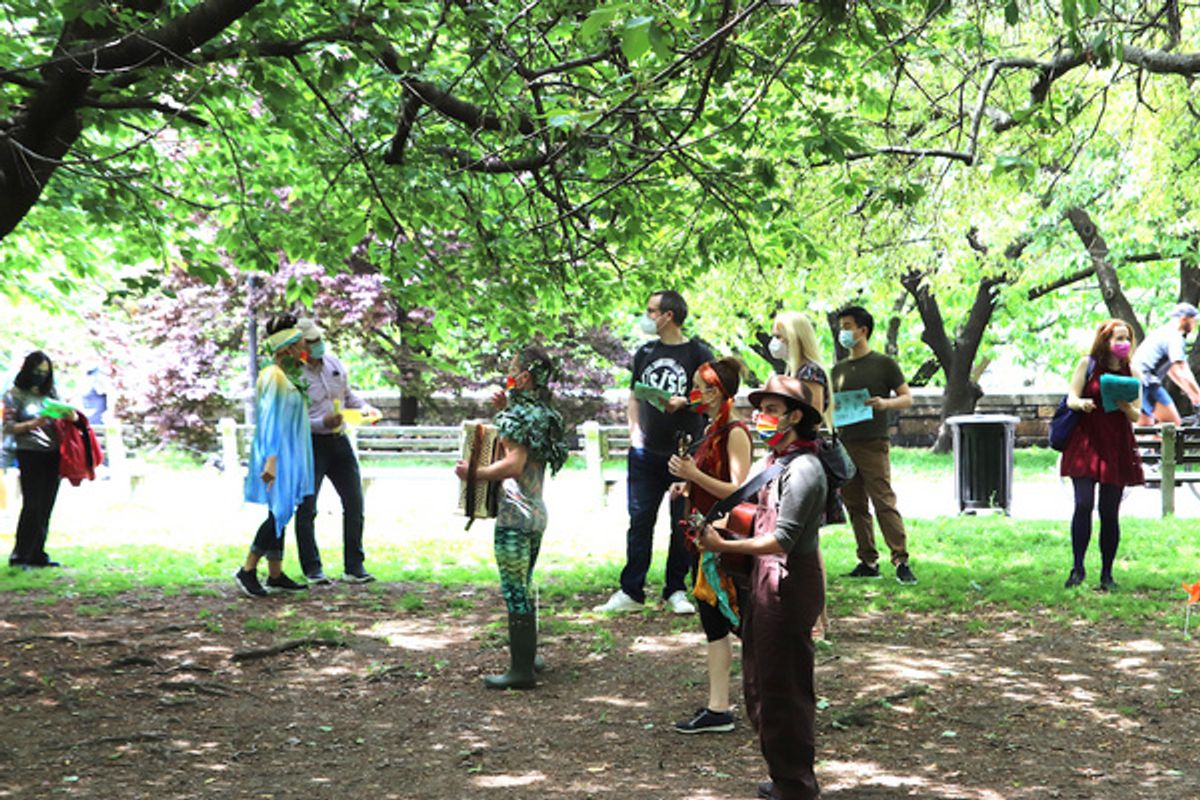Audience reading under the trees at First Look at Prospect Theater Company's Interactive TREE TALES on May 22