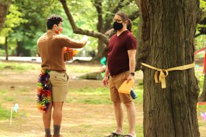 Michael de Souza, aka Chester the Squirrel, offers and audience member a story.  Photo