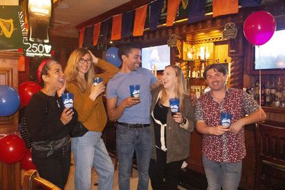 Team Blue at the Bragging Rights red carpet premiere hosted by St. Pats Bar & Grill i Photo