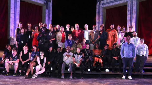 Andre De Shields (seated in cream top) and the Company of KING LEAR. Photo by Lia Cha Photo