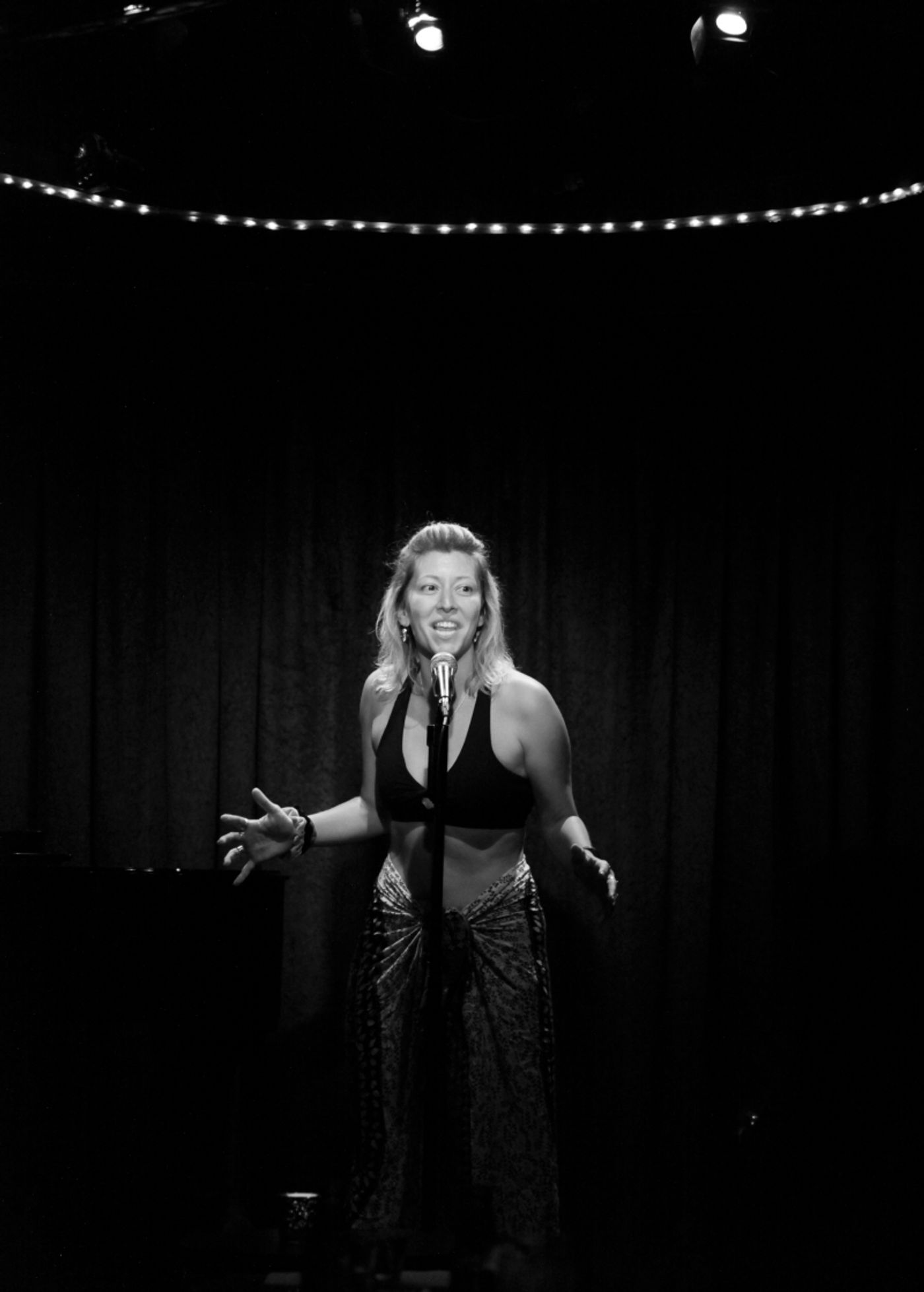 Review: Jackie Theoharis Sizzles in Song and Stories in THE TRUTH ABOUT GREECE  Image