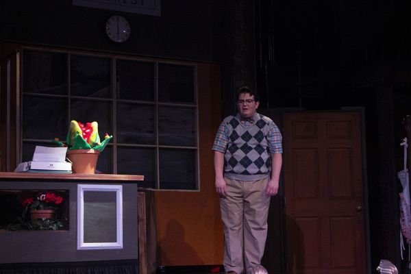 Seymour (Isaac Wesley Wilson) and Audrey II in the Arizona Broadway Theatre productio Photo