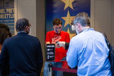 Audience members arrive to the first preview of PASS OVER Photo