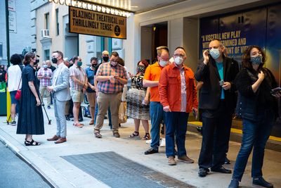 Audience members arrive to the first preview of PASS OVER Photo