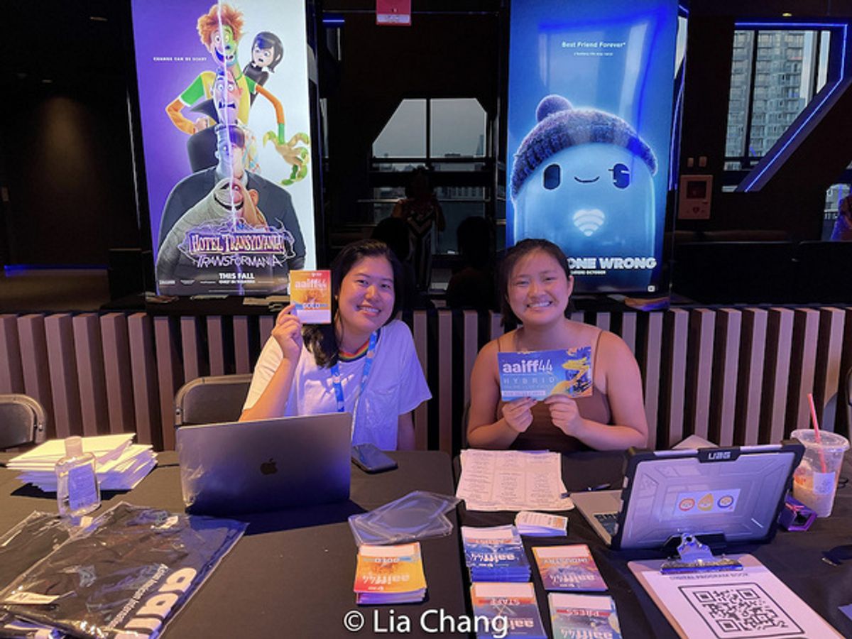 AAIFF44 staff members Anna Sang and Kelsey Chin at the Festival check in table. at Photos: The 44th Asian American International Film Festival Kicks Off in NYC