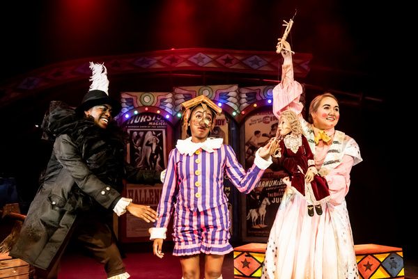 Reice Weathers as Fellino, Cassandra Hercules as Pinocchio and Alice De-Warrenne as t Photo