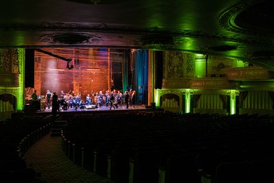 The American Pops Orchestra prepares to film a performance Photo