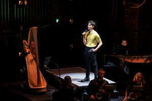 Isaac Powell performs "Dancing Through Life" Photo