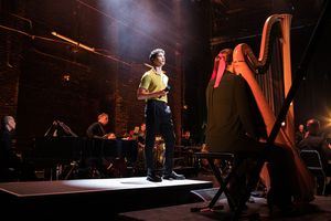 Isaac Powell performs "Dancing Through Life" Photo