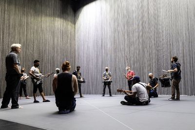 David Byrne and the company of American Utopia Photo
