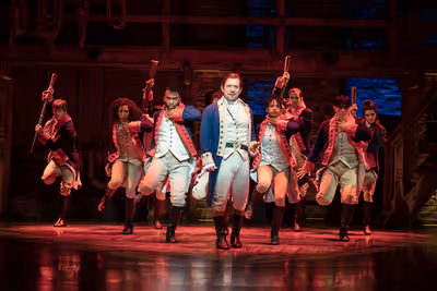 Miguel Cervantes and the ensemble of HAMILTON  Photo