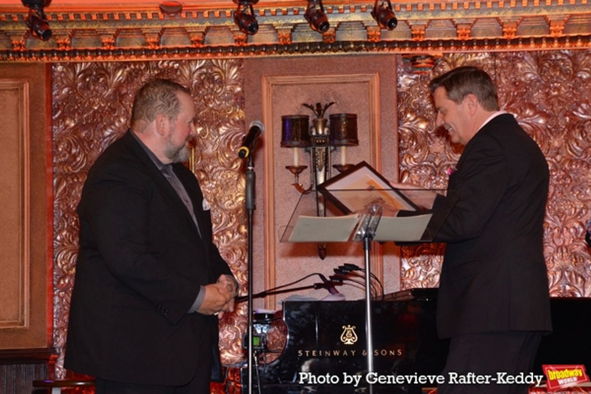 Jeff Carney (The New York Pops Principal Bass) accepting Award on behalf of TNYP Orchestra Musicians  from Steven Reineke at 