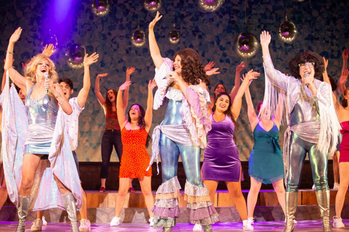 Sandy Bainum, Kim Huber and Lisa Dyson with the company at 