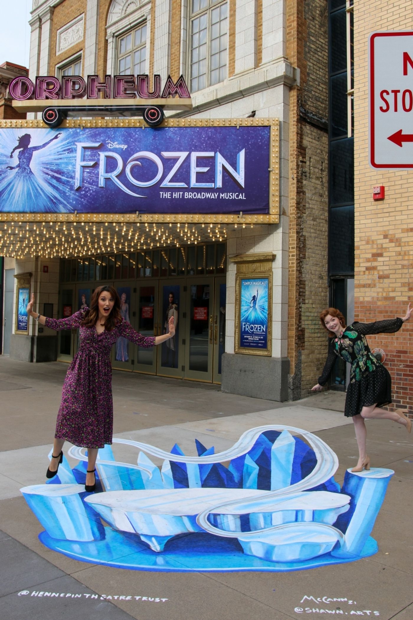 Caroline Bowman and Caroline Innerbichler in front of Orpheum Theatre Minneapolis