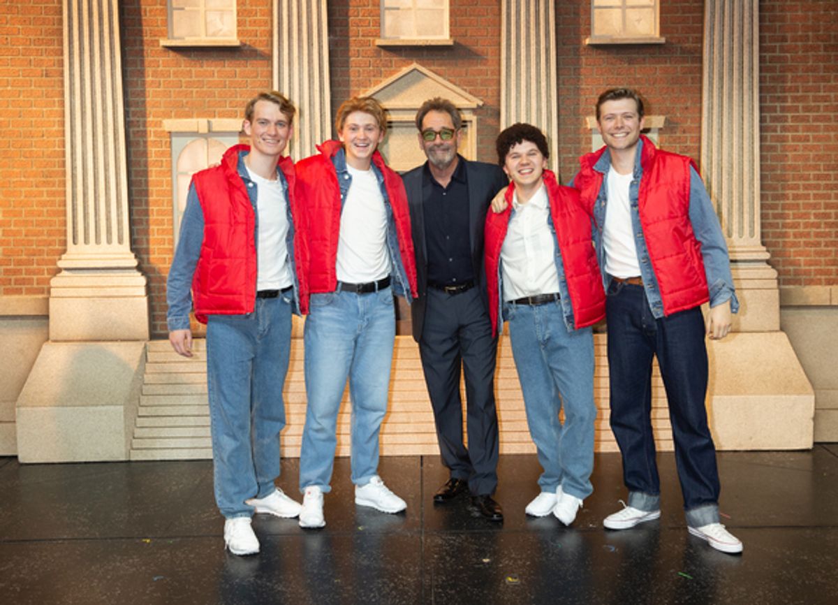 Huey Lewis with the male ensemble at 