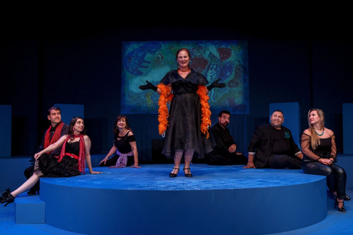 (center) Cheryl Woertz with the cast