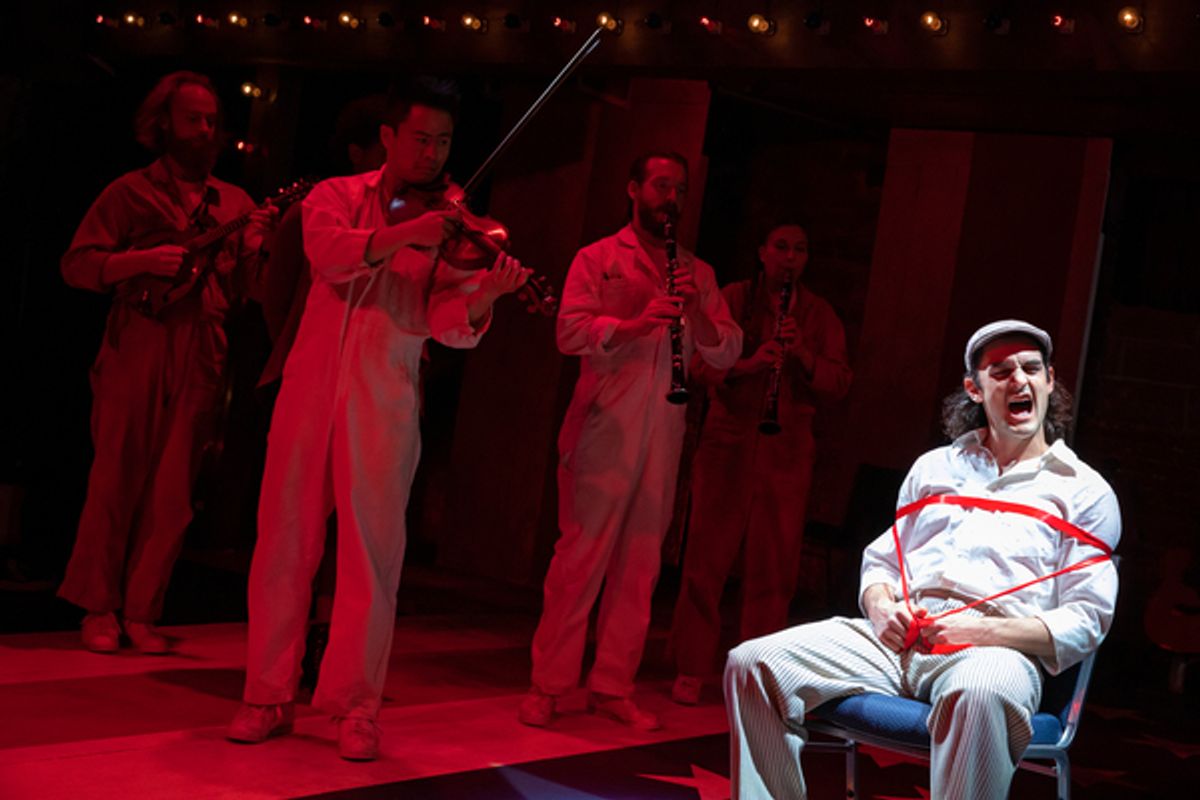 Wesley Taylor and members of the ensemble