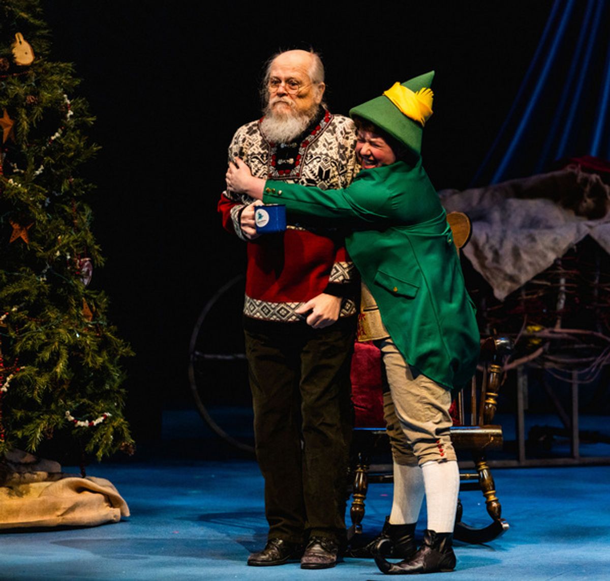 Bruce Rowan as Santa and Sayer Keeley as Buddy in Stages Theatre Company''s Elf the Musical, Jr. (Nov 19-Dec 27, 2021). Photo by Fischeye Films. at Photos: First Look at ELF THE MUSICAL, JR. At Stages Theatre Company