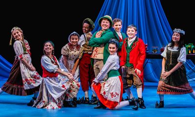 Sayer Keeley as Buddy & the cast of Stages Theatre Company''s Elf the Musical, Jr. (N Photo