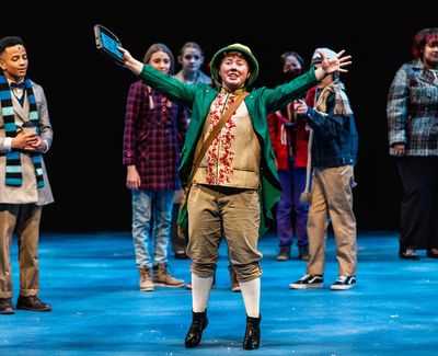 Sayer Keeley as Buddy & the cast of Stages Theatre Company''s Elf the Musical, Jr. (N Photo