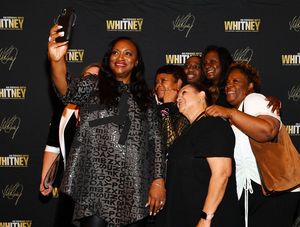 LAS VEGAS, NEVADA - NOVEMBER 14: Pat Houston takes a selfie with fans at An Evening With Whitney: The Whitney Houston Hologram Concert at Harrah's Las Vegas on November 14, 2021 in Las Vegas, Nevada. (Photo by Denise Truscello/Getty Images for An Evening with Whitney) @ BroadwayWorld LAS VEGAS, NEVADA - NOVEMBER 14: Pat Houston takes a selfie with fans at An Evening Photo