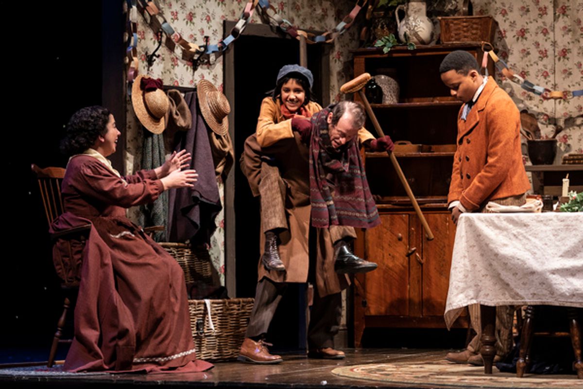 Susaan Jamshidi (Mrs. Cratchit) Gayatri Gadhvi (Tiny Tim) Thomas J. Cox (Bob Cratchit) Nelson H. Simmons (Peter Cratchit) at 