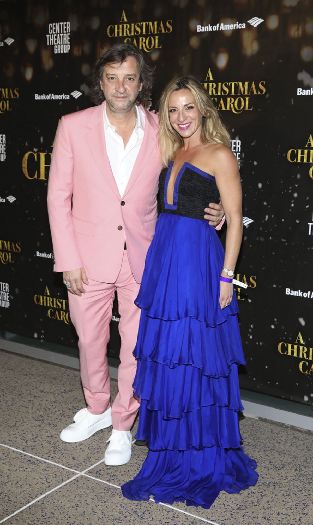 From left, British costume designer Rob Howell and choreographer Lizzi Gee arrives for the opening night performance of ?A Christmas Carol? at Center Theatre Group/Ahmanson Theatre on Dec. 1, 2021, in at 