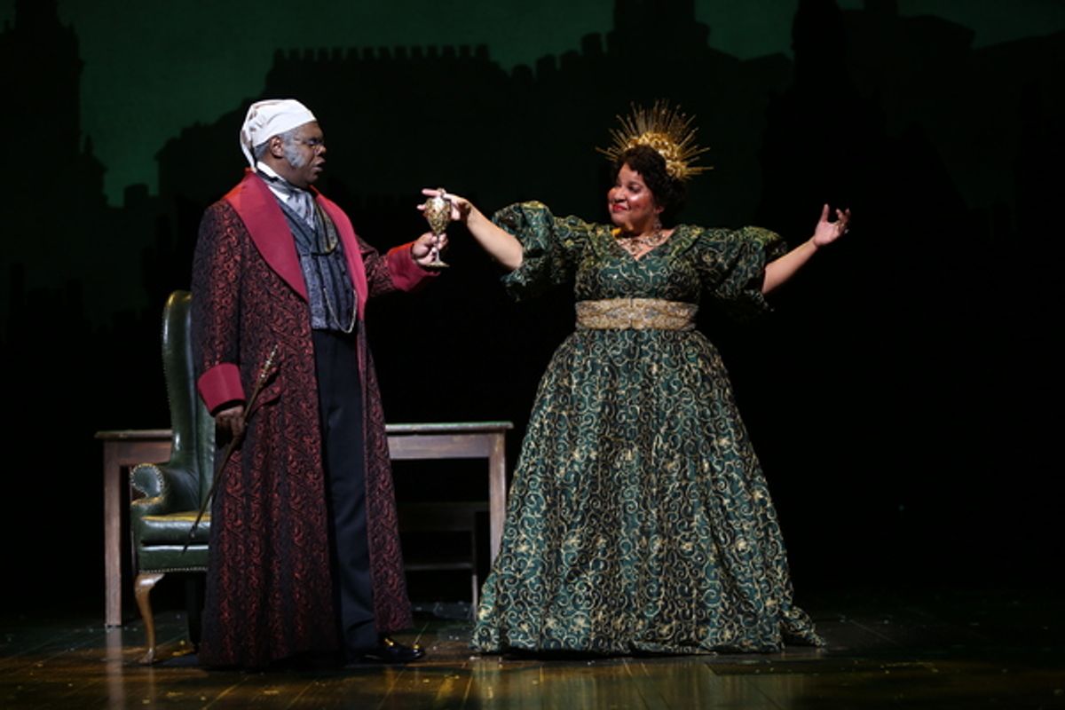 Craig Wallace as Ebenezer Scrooge and Rayanne Gonzales as Spirit of Christmas Present at 