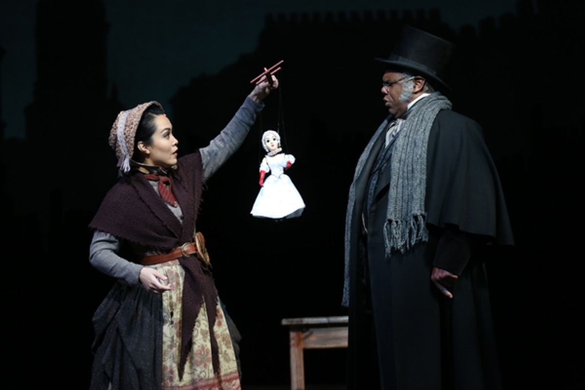 Justine “Icy” Moral as Doll Vendor and Craig Wallace as Ebenezer Scrooge at 