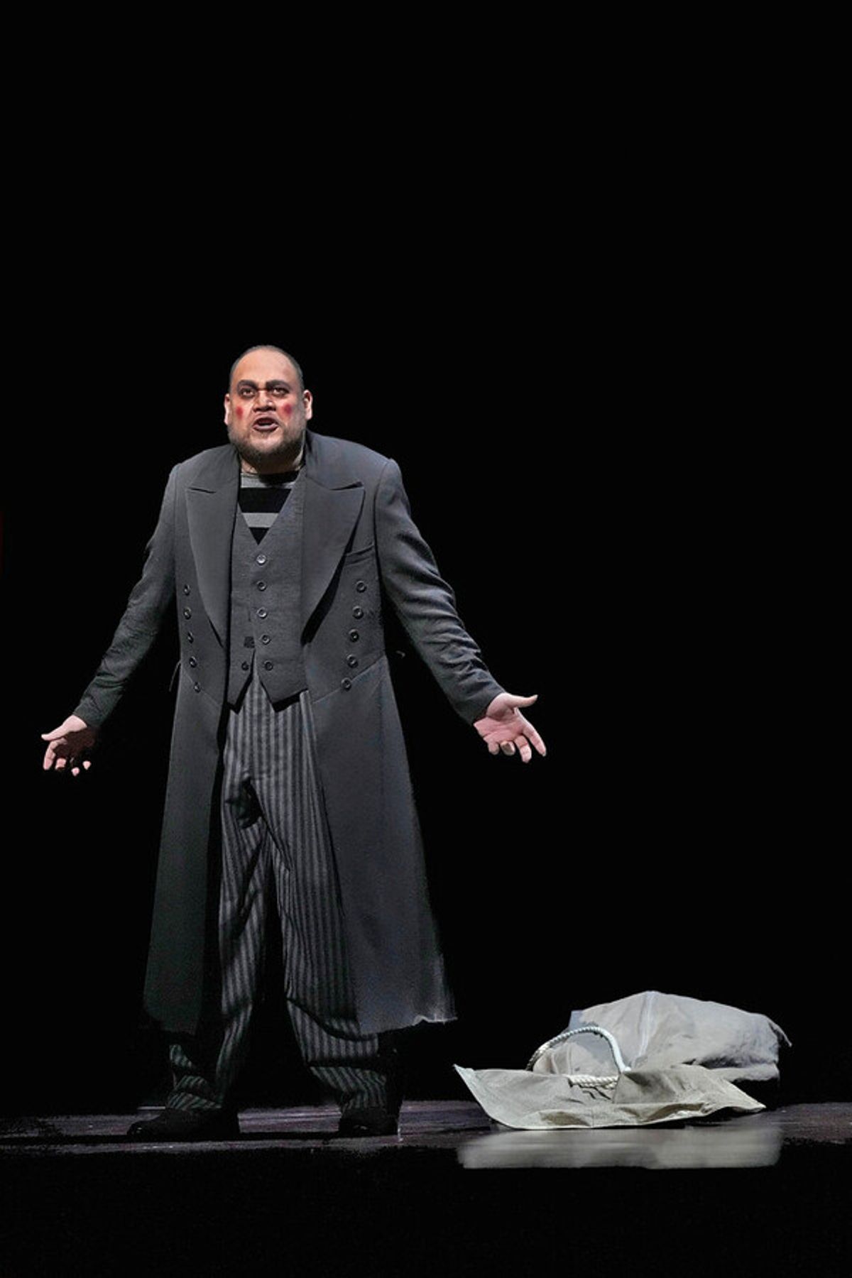 Quinn Kelsey in the title role of Verdi's 'Rigoletto.' Photo: Ken Howard / Met Opera
 at 