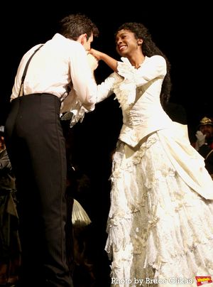 John Riddle as "Raoul" and Emilie Kouatchou as "Christine Daae" @ BroadwayWorld John Riddle as "Raoul" and Emilie Kouatchou as "Christine Daae" Photo