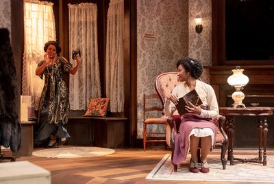 Annelle (Ayanna Bria Bakari, left) tries to tempt her sister Janet (Jaye Ladymore) in Photo